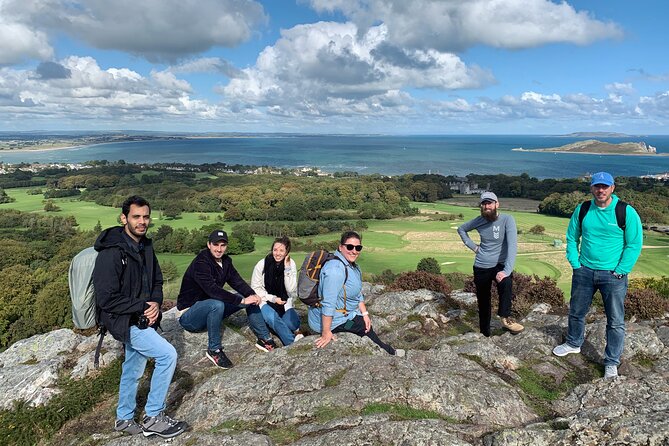 Dublin Coastal Hike with Howth Adventures - Wildflowers and Summit Air: Heathland Steps Toward Baily Lighthouse