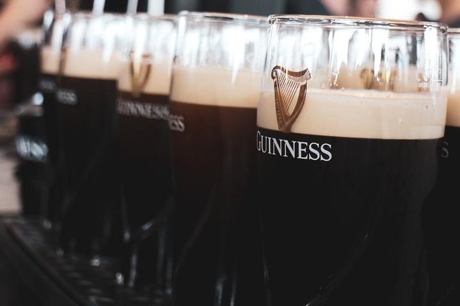 Dublin Jameson Distillery and Guinness Storehouse Guided Tour - The Walk Through Dublin: Cobblestones, Hills, and a Quick Pub Photo Stop
